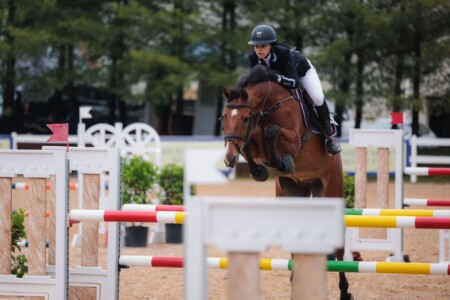 Kacy Lyn Smith and Chicago M. won 1st place in the 1.30m Junior Jumpers at the Lexington Spring Premiere